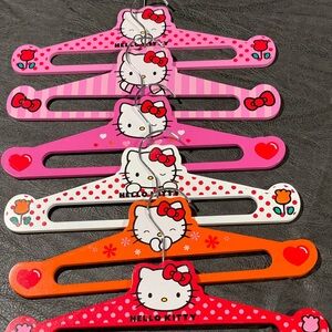 Hello Kitty hangers.  Six wooden hangers total